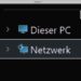 Das Foto zeigt einen vergrößerten Windows-Explorer, in dem die Punkte "Dieser PC" und "Netzwerk" zu sehen sind.